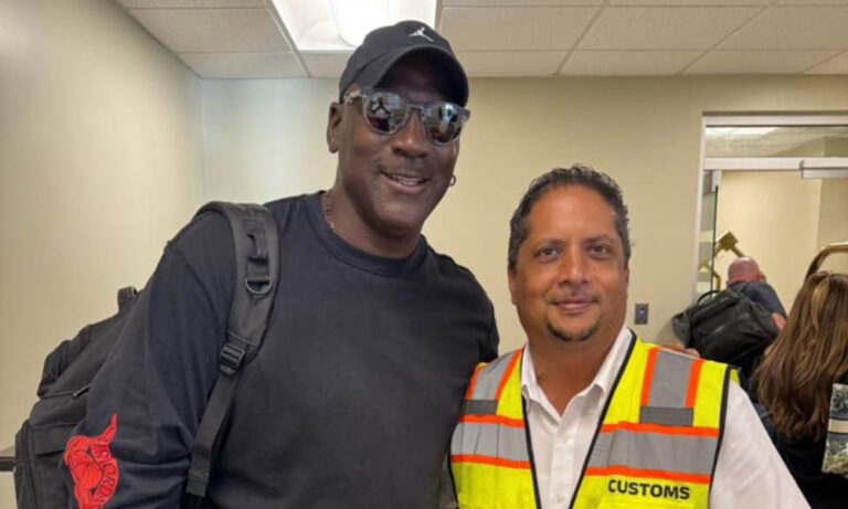 Michael Jordan poses for photo with fan. Credit: SLHTA via Facebook.