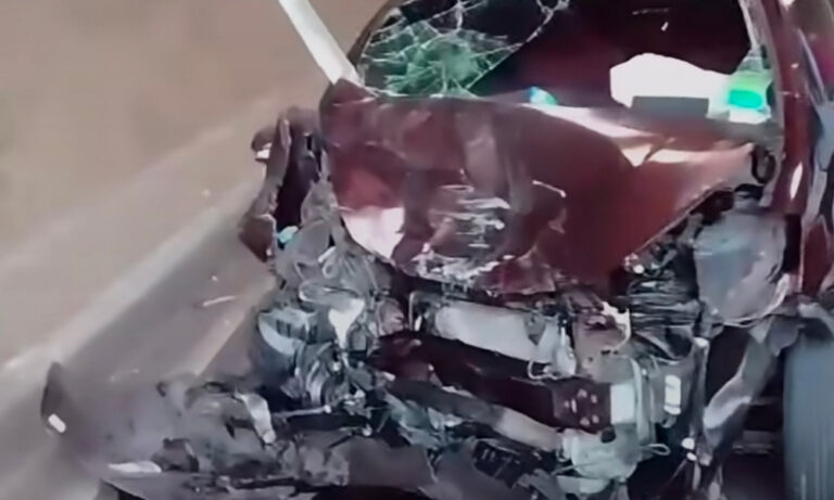 Nine Injured in Millennium Highway Crash. Firefighters Extricate Driver